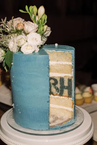 The bride and groom's initials are revealed when this wedding cake is cut open.