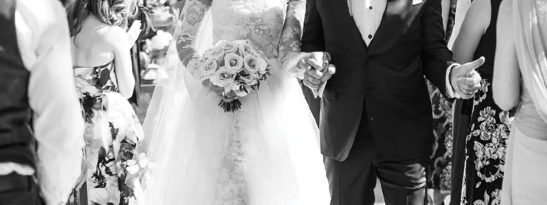 Sarah Keller and David Houck walk down the aisle at their wedding at Kestrel Park in Santa Ynez.
